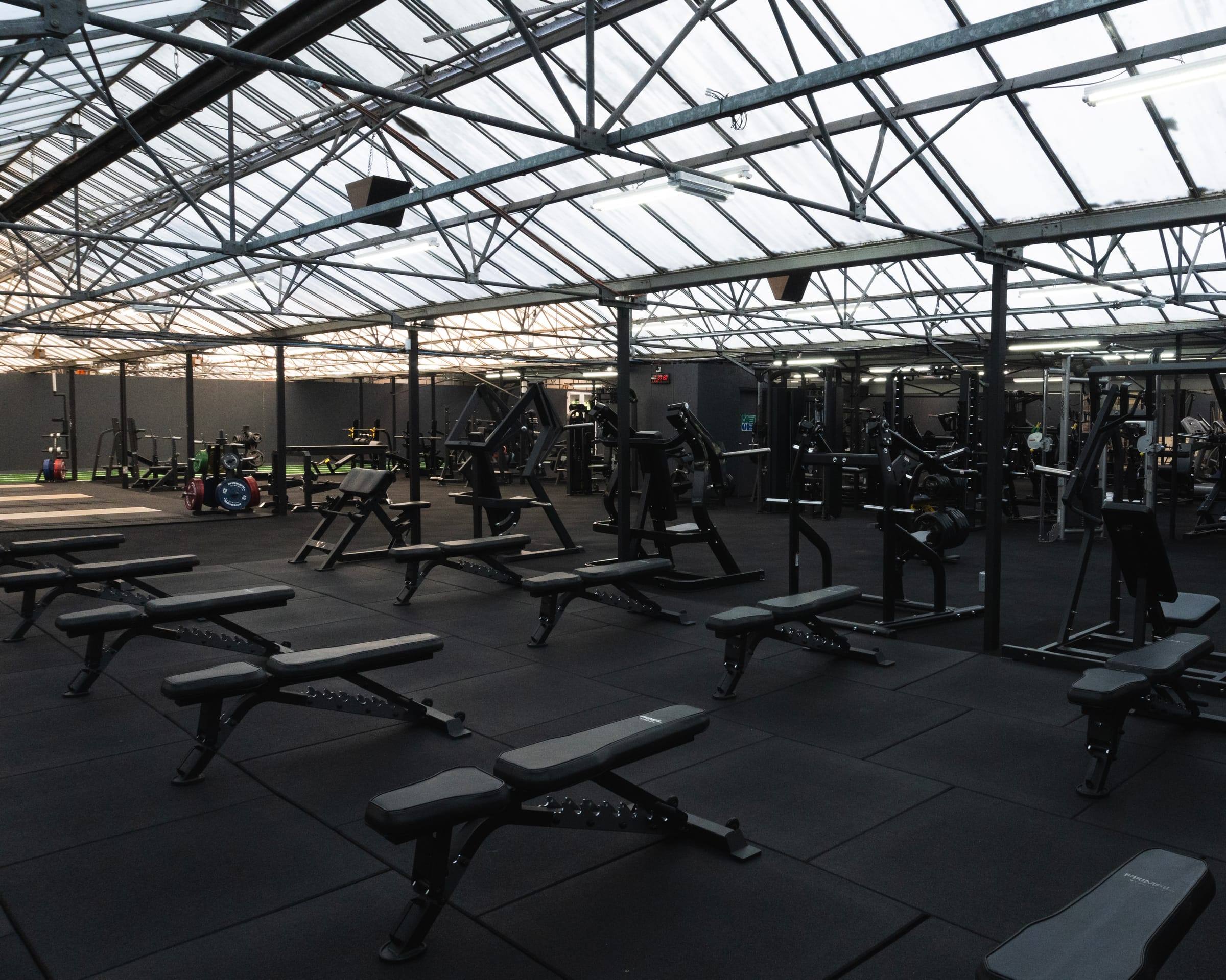 Wide view of the Bristol gym floor: benches, racks and machines across 12,500 sq ft